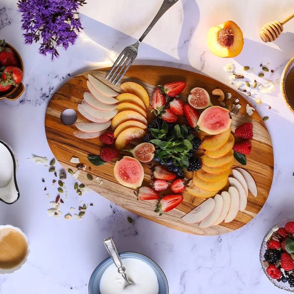 TeakHaus Edge Grain Oval Cutting And Serving Board | 18" X 12" X .55" 2 TeakHaus Edge Grain Oval Cutting And Serving Board | 18" X 12" X .55" - Image 2