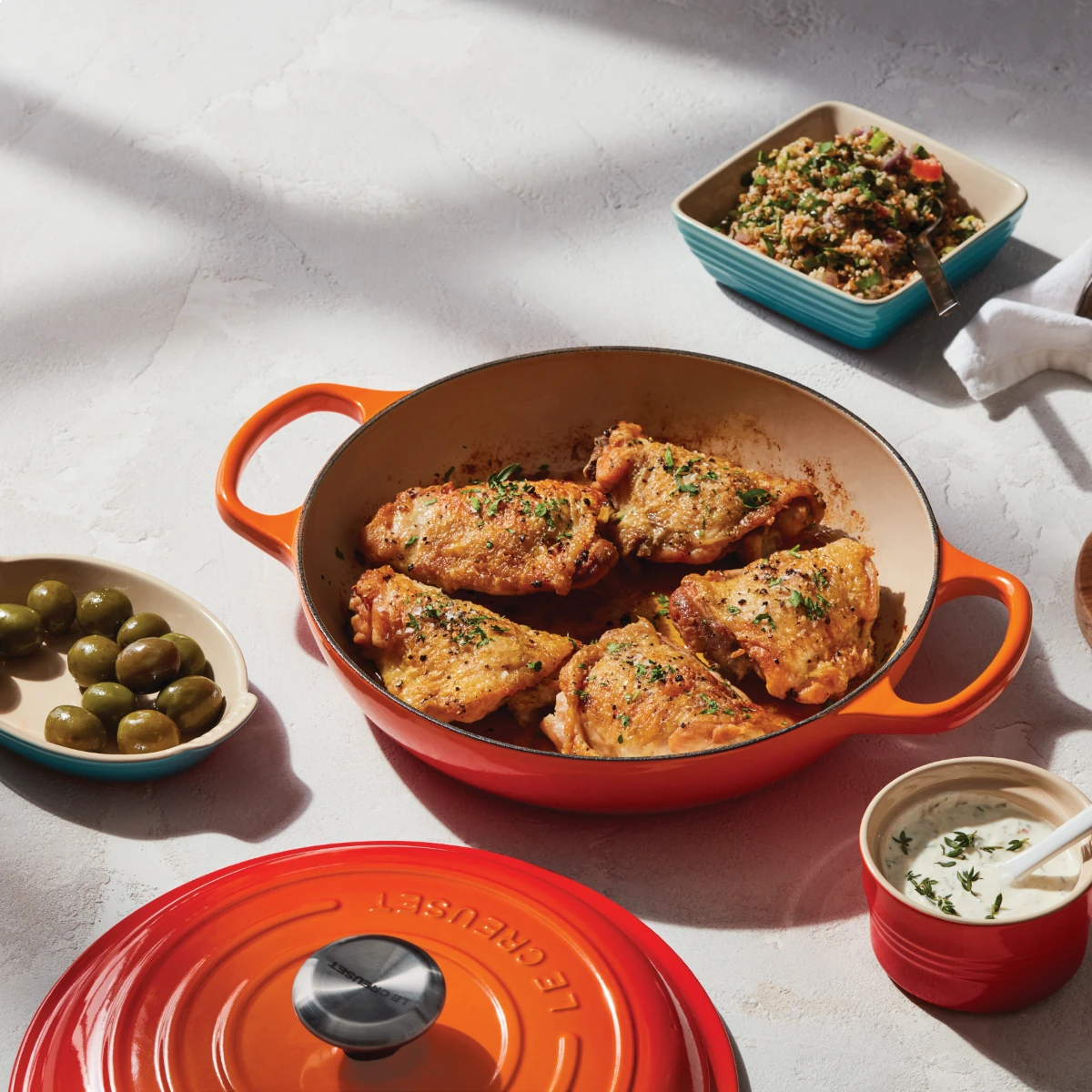 Le Creuset 2.25 Qt. Signature Enameled Cast Iron Braiser With Stainless Steel Knob | Flame Orange 4 Le Creuset 2.25 Qt. Signature Enameled Cast Iron Braiser With Stainless Steel Knob | Flame Orange - Image 4