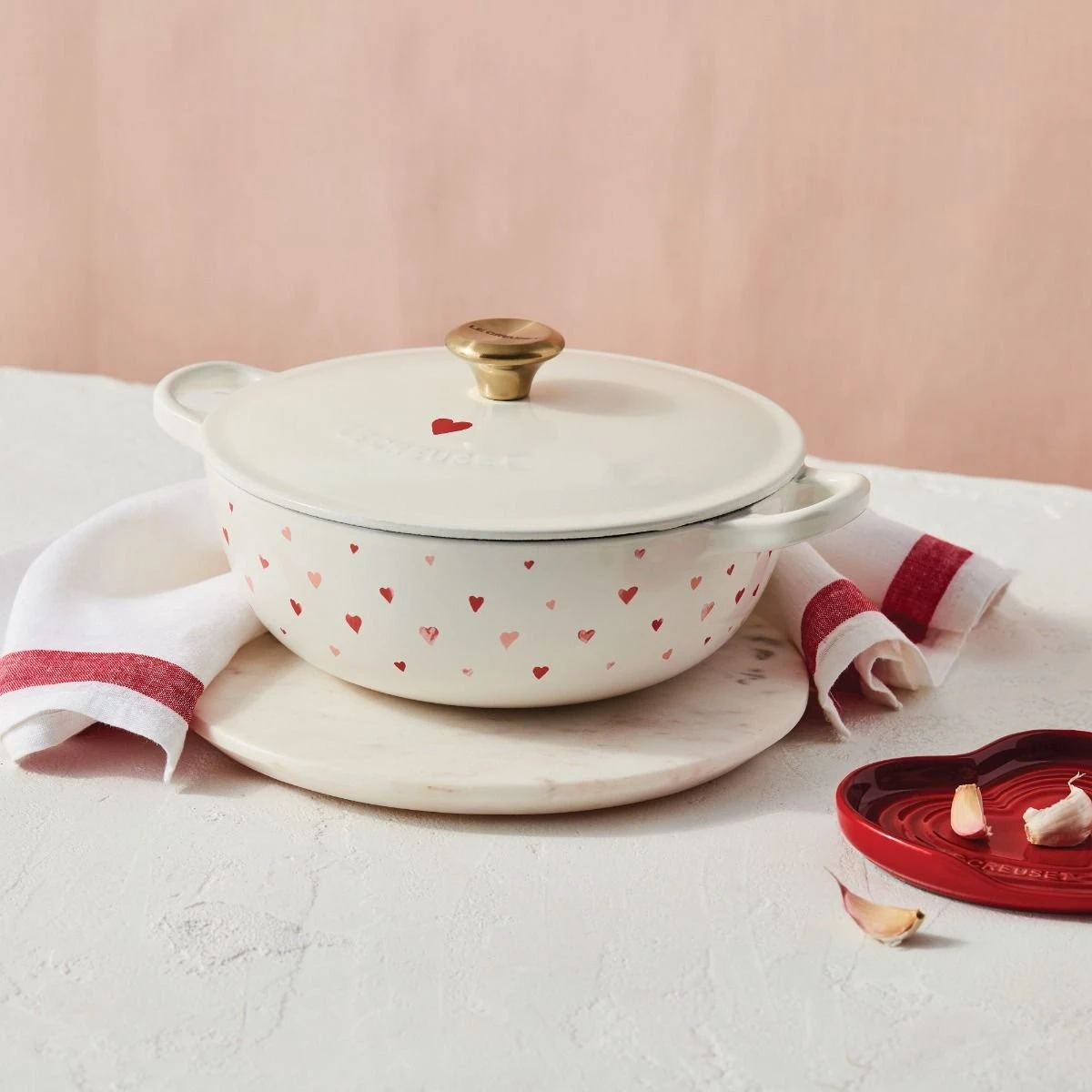 Le Creuset L'Amour 2.75 Qt. Enameled Cast Iron Soup Pot With Gold Knob & Heart Applique | White 5 Le Creuset L'Amour 2.75 Qt. Enameled Cast Iron Soup Pot With Gold Knob & Heart Applique | White - Image 5